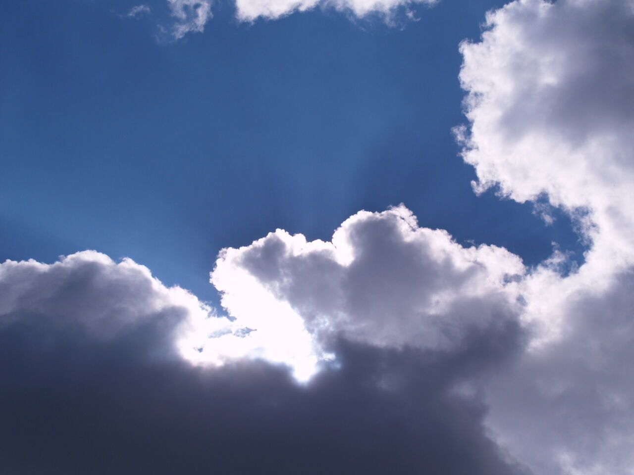 Sunlight breaking through storm clouds